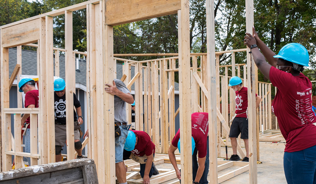 Whirlpool and IU students framing a house at a Habitat for Humanity build