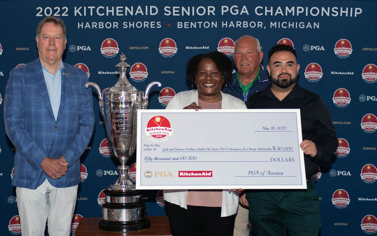 Jack and Barbara Nicklaus / KitchenAid Sr PGA Scholarship recipient with large check, 2022
